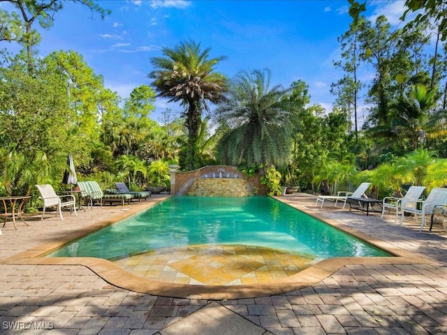 pool featuring a patio