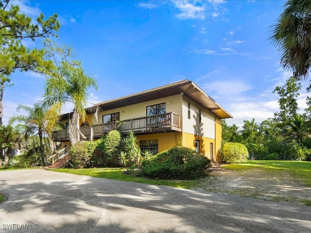 view of property featuring driveway