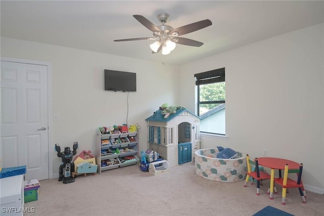 game room featuring carpet floors and ceiling fan