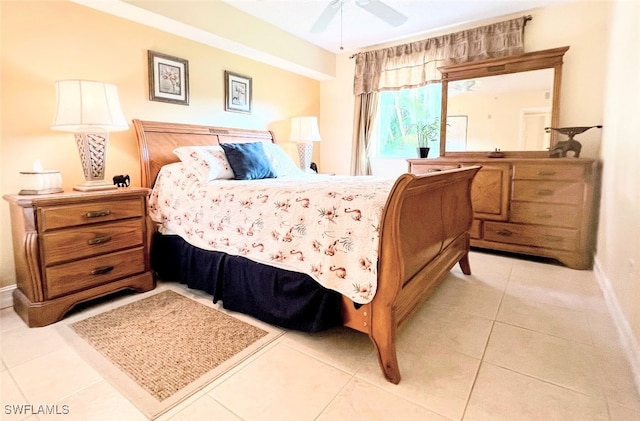 bedroom featuring light tile patterned flooring and ceiling fan