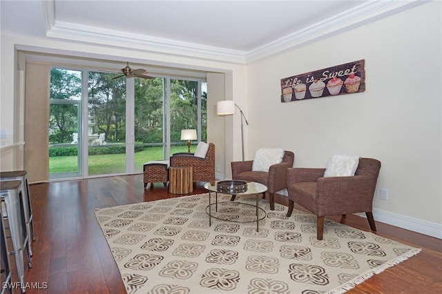 living area with ceiling fan, light hardwood / wood-style flooring, crown molding, and a healthy amount of sunlight