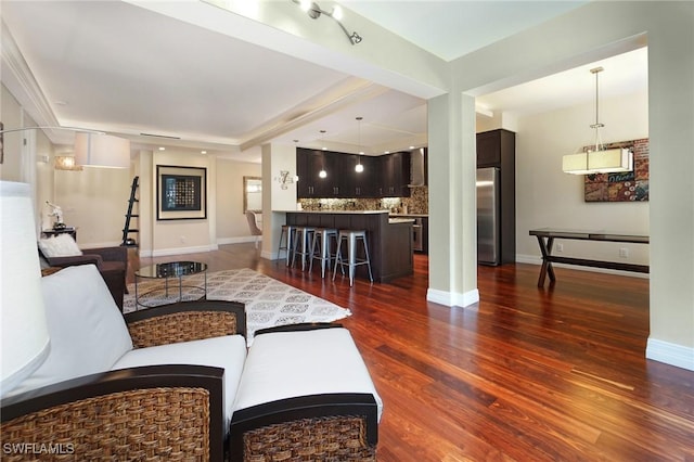 living room with dark hardwood / wood-style floors