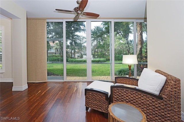 sunroom with ceiling fan