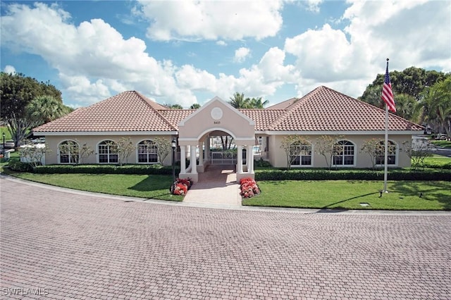 view of front of home with a front lawn