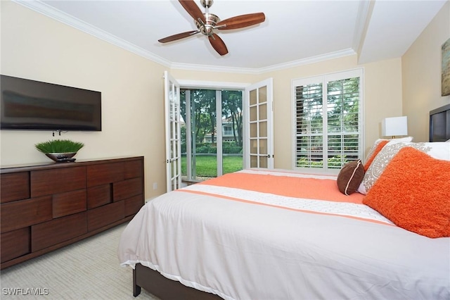 carpeted bedroom featuring ceiling fan, access to exterior, and ornamental molding