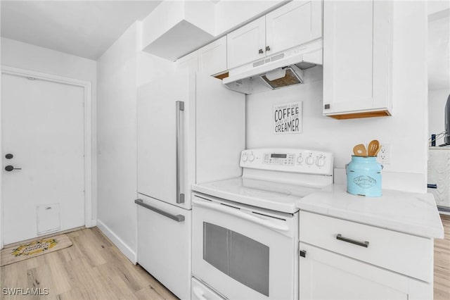 kitchen featuring white electric stove, light stone countertops, light wood-type flooring, and white cabinets