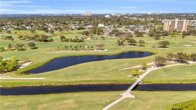 surrounding community featuring a water view