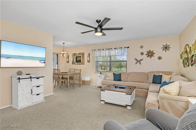 living room featuring carpet and ceiling fan