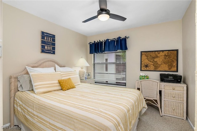 bedroom featuring ceiling fan and carpet flooring