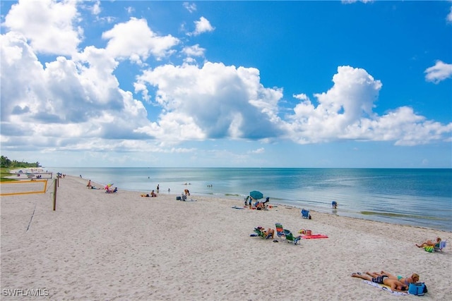 property view of water featuring a beach view