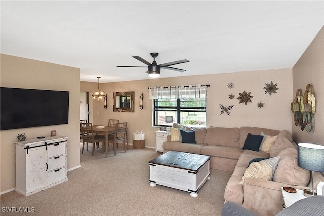 carpeted living room featuring ceiling fan