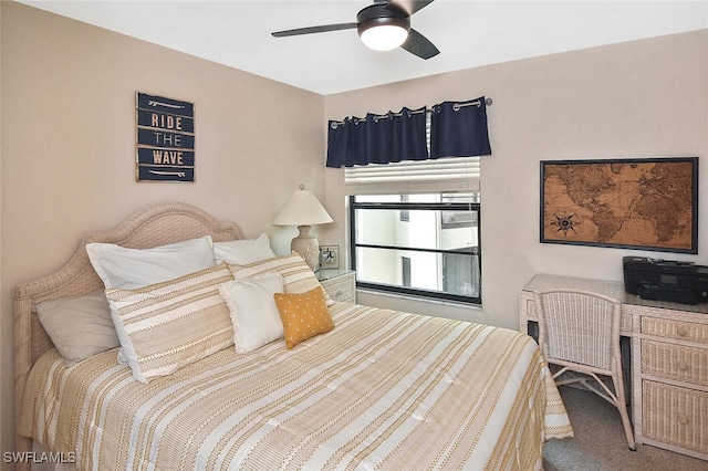 bedroom with ceiling fan and carpet flooring