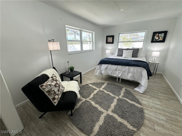 bedroom featuring light hardwood / wood-style flooring