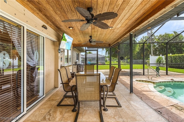 sunroom featuring wood ceiling