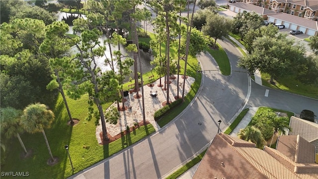 birds eye view of property with a residential view