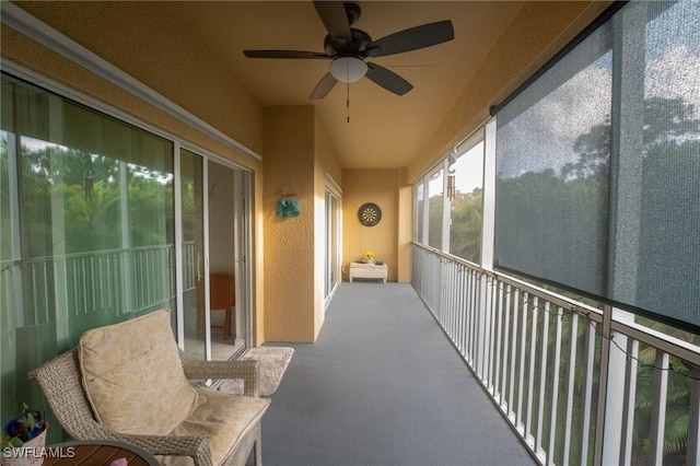 balcony featuring ceiling fan