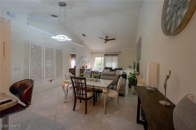 dining space with high vaulted ceiling, light tile patterned floors, visible vents, and ornamental molding