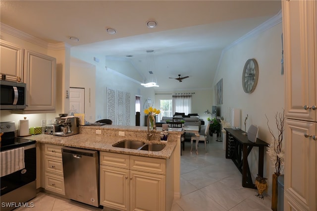 kitchen with lofted ceiling, light tile patterned floors, light stone counters, stainless steel appliances, and sink