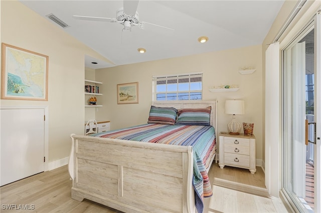 bedroom with ceiling fan, multiple windows, and light wood-type flooring