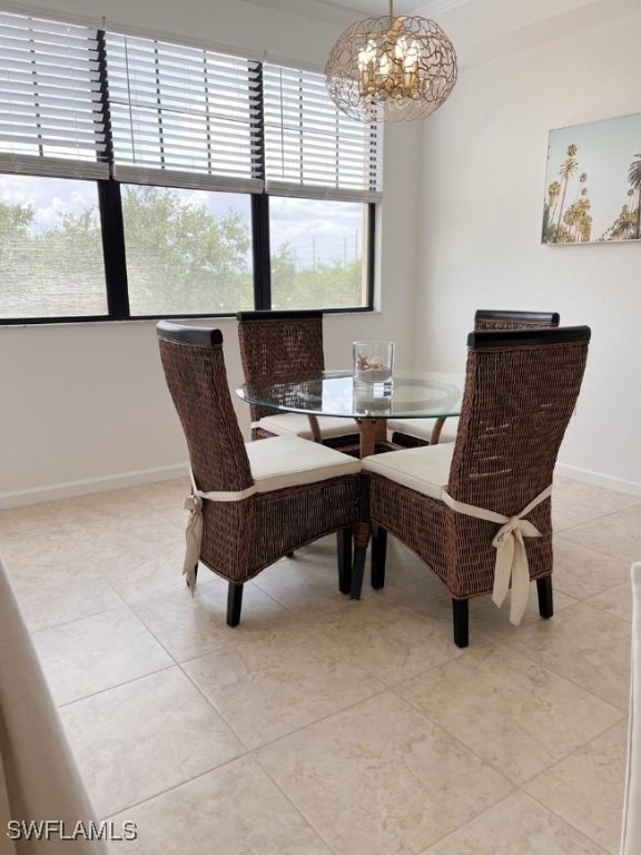 tiled dining area featuring a notable chandelier