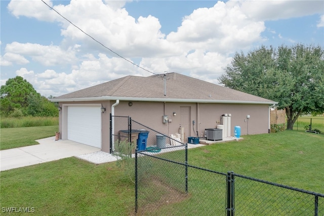 exterior space with cooling unit and a lawn