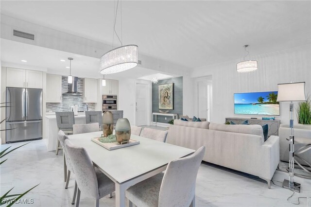 dining room featuring light tile patterned flooring