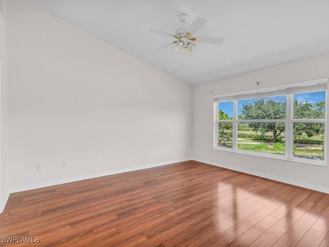 unfurnished room featuring ceiling fan and hardwood / wood-style flooring