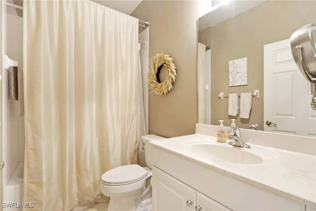 full bathroom featuring shower / bathtub combination with curtain, toilet, vanity, and tile patterned floors