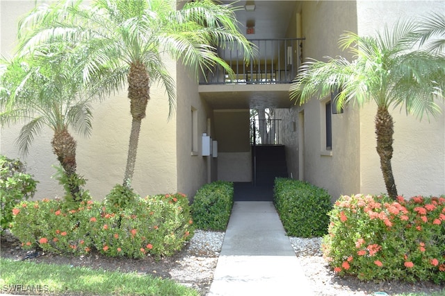 property entrance with a balcony