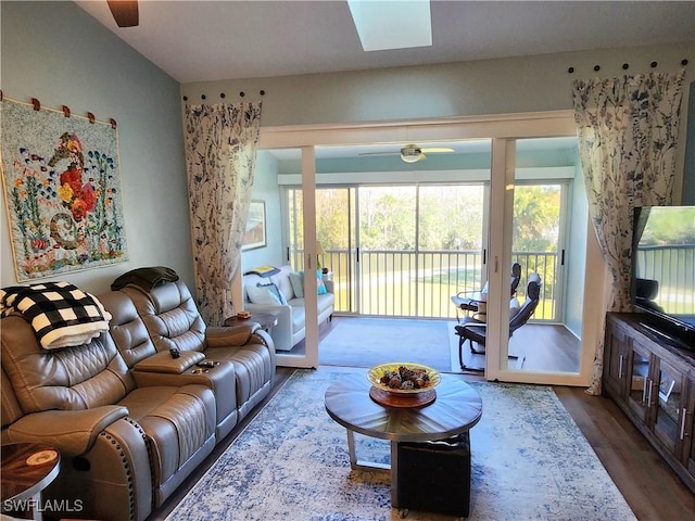 living area featuring ceiling fan and wood finished floors