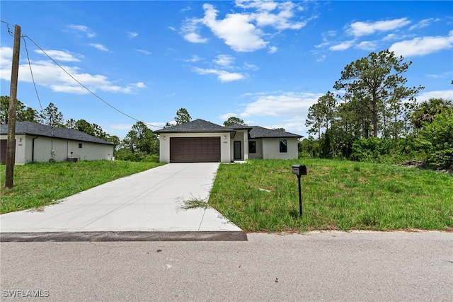 ranch-style house featuring a garage