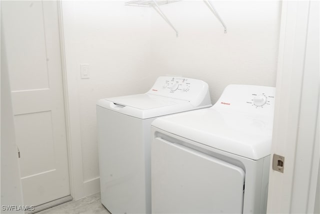 laundry area featuring separate washer and dryer