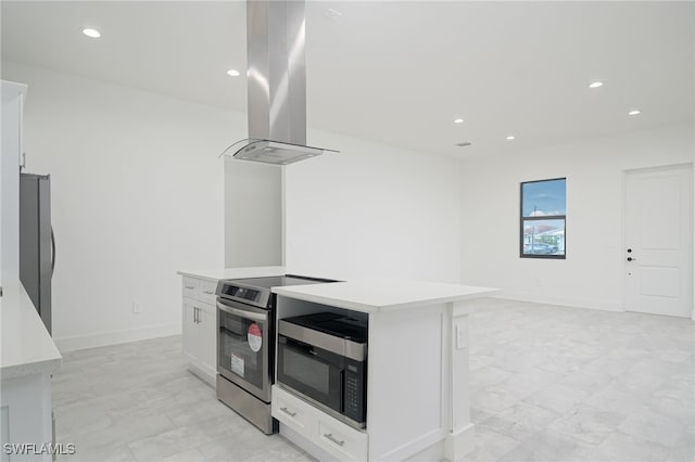 kitchen featuring island range hood, a kitchen island, white cabinetry, and appliances with stainless steel finishes