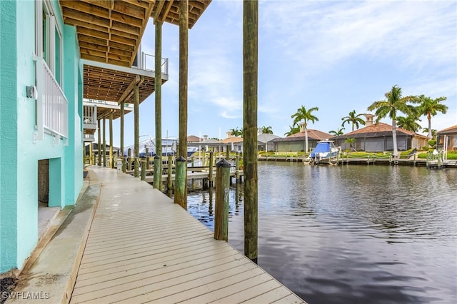 dock area with a water view