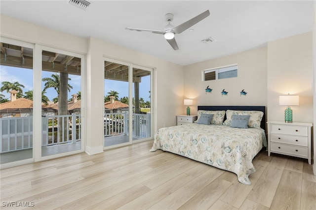 bedroom with access to exterior, ceiling fan, and light hardwood / wood-style flooring