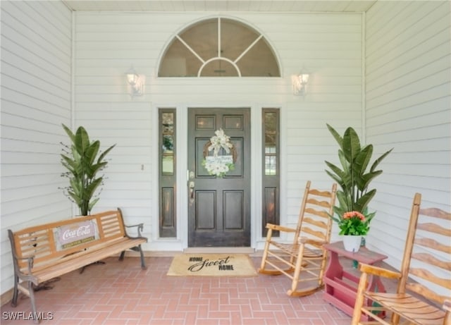 entrance to property with a porch