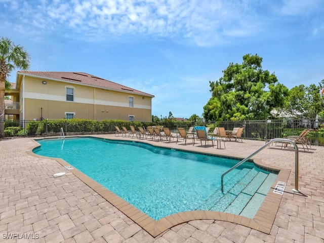 view of pool featuring a patio