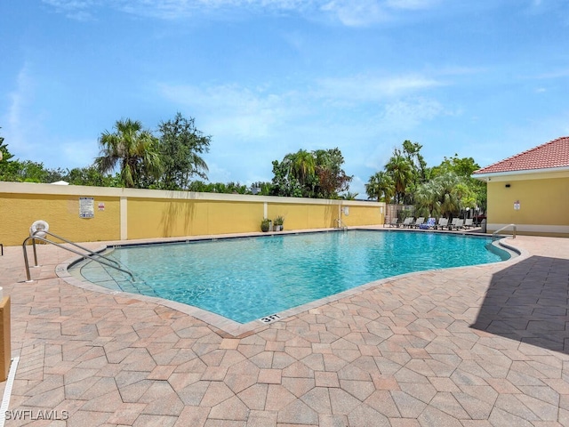 view of pool featuring a patio area