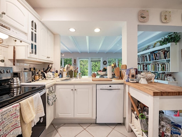 kitchen featuring wooden counters, electric range, white cabinetry, white dishwasher, and light tile patterned floors