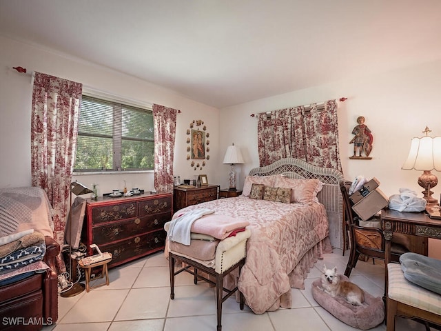 bedroom featuring light tile patterned floors