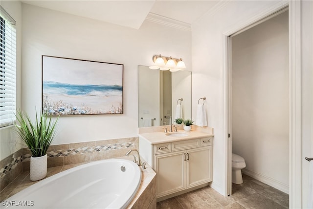 bathroom with toilet, vanity, a relaxing tiled tub, and crown molding