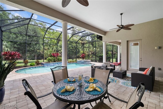 view of patio featuring ceiling fan, a swimming pool with hot tub, an outdoor hangout area, and a lanai