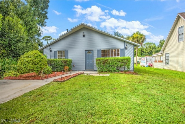 view of front of property with a front lawn