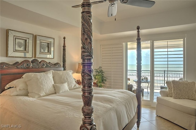 bedroom featuring access to exterior, a ceiling fan, and light tile patterned floors