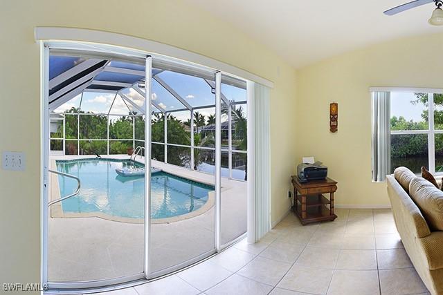 view of pool featuring a ceiling fan