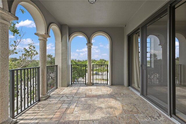 view of patio / terrace with a balcony