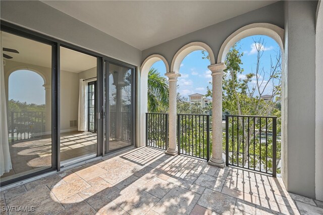 view of patio / terrace with a balcony