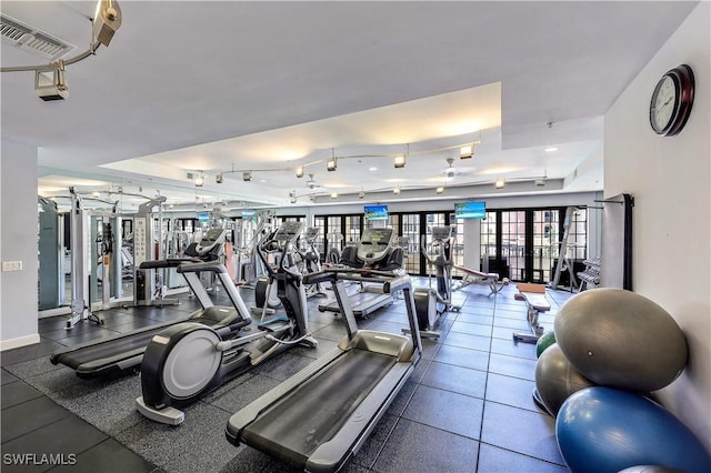 workout area featuring visible vents and baseboards