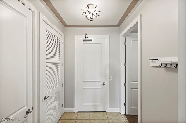 hallway featuring light tile patterned flooring