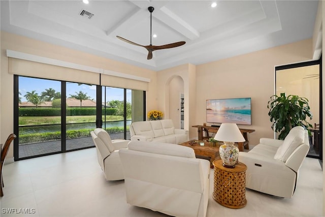 living room featuring coffered ceiling, beamed ceiling, and ceiling fan